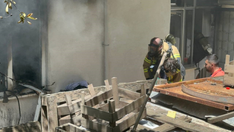 Bursa'da alevlerin arasından 2 çocuğu kurtardılar