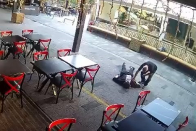 Bayılan gence yardım etmek yerine cüzdanını çaldı